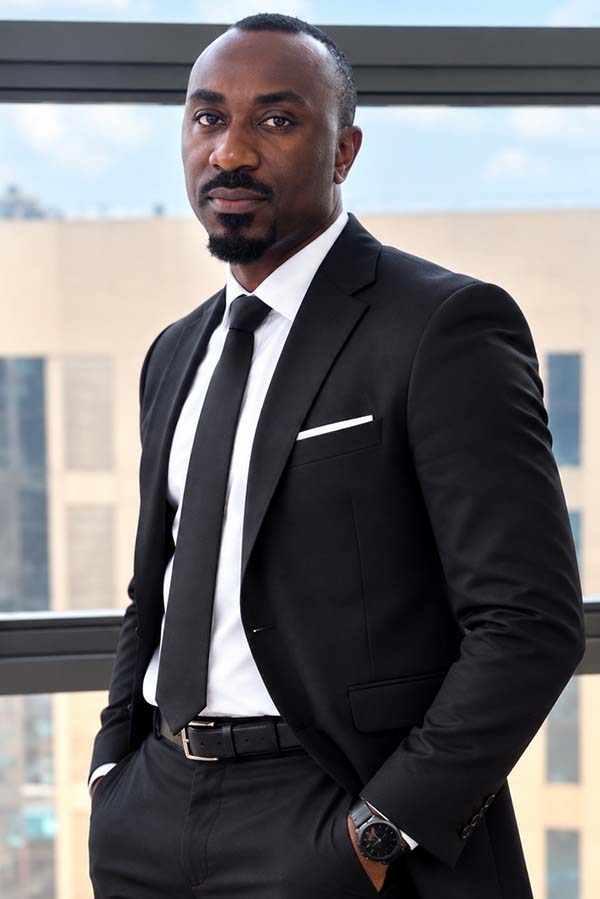 Cleghton Kansiime - Director